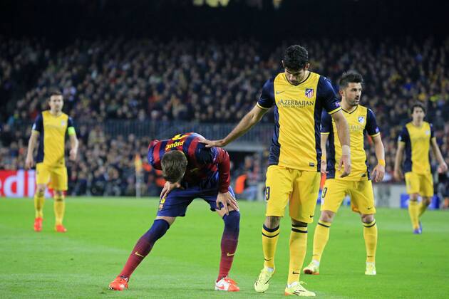 April 1, 2014 - Barcelona, Spain - Gerard Pique injury in the match between FC Barcelona and Atletico de Madrid for the first leg of the quarterfinals round of the Champions League at the Camp Nou on April 1, 2014. Photo: Joan Valls Urbanandsport Nurphoto. Champions League: FC Barcelona vs Atletico Madrid  - ZUMAn23