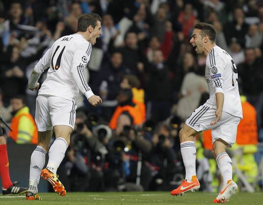 Soccer match between Real Madrid and Borussia Dortmund of the Champions League, held at the Santiago Bernabeu stadium, in Madrid 04 02 2014. Gareth Bale celebrates after scoring 