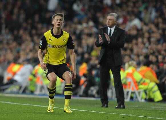Borussia Dortmund Defender, number 37 DURM - Erik Durm (20), Real Madrid Coach ANCELOTTI - Carlo Ancelotti (53) during round cuartos de final of the champions league league, soccer match between Real CF Madrid - BVB Borussia Dortmund at the Santiago Bernabeu estadium, Madrid - 