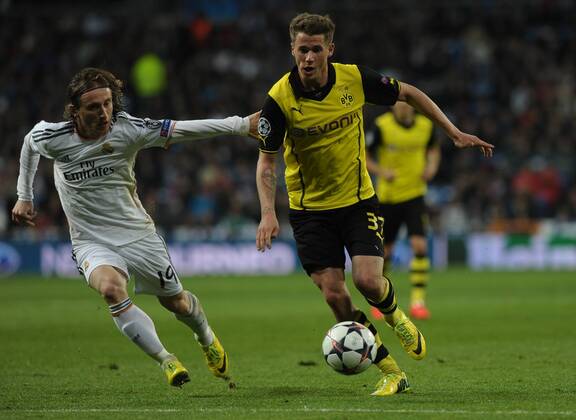 Borussia Dortmund Defender, number 37 DURM - Erik Durm (20), Real Madrid Midfielder, number 19 MODRIC - Luka Modric (27) during round cuartos de final of the champions league league, soccer match between Real CF Madrid - BVB Borussia Dortmund at the Santiago Bernabeu estadium, Madrid - 