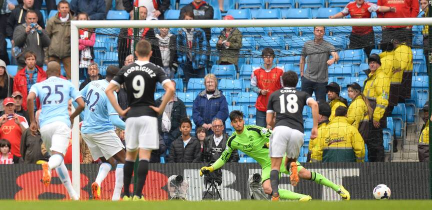 Yaya Toure of Manchester City scores a penalty - Barclays Premier League - Manchester City v Southampton - Etihad Stadium - Manchester - England - 5th April 2014 - Pic Simon Bellis Sportimage EDITORIAL USE ONLY. No use with unauthorised audio, video, data, fixture lists, club league logos or live services. Online in-match use limited to 120 images, no video emulation. No use in betting, games or single club league player publications.
