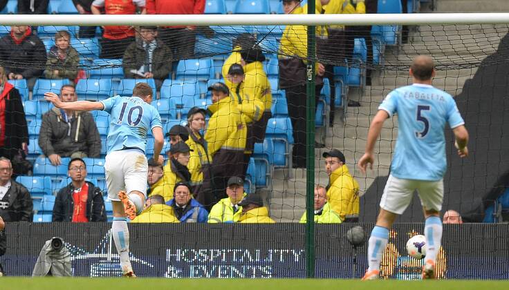 Edin Dzeko of Manchester City scores the third goal - Barclays Premier League - Manchester City v Southampton - Etihad Stadium - Manchester - England - 5th April 2014 - Pic Simon Bellis Sportimage EDITORIAL USE ONLY. No use with unauthorised audio, video, data, fixture lists, club league logos or live services. Online in-match use limited to 120 images, no video emulation. No use in betting, games or single club league player publications.