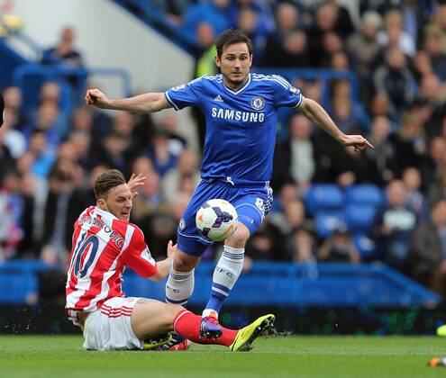 Chelsea s Frank Lampard tussles with Stoke s Marko Arnautovic Chelsea vs Stoke City- Premier League - Stamford Bridge- London - England - 05 03 2014 - Pic David Klein Sportimage EDITORIAL USE ONLY. No use with unauthorised audio, video, data, fixture lists, club league logos or live services. Online in-match use limited to 120 images, no video emulation. No use in betting, games or single club league player publications.