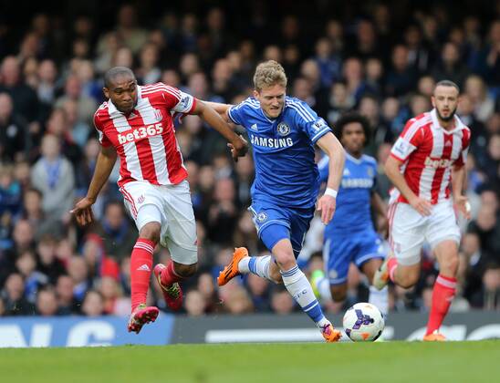 Chelsea s Andre Schurrle tussles with Stoke s Wilson Palacios Chelsea vs Stoke City- Premier League - Stamford Bridge- London - England - 05 03 2014 - Pic David Klein Sportimage EDITORIAL USE ONLY. No use with unauthorised audio, video, data, fixture lists, club league logos or live services. Online in-match use limited to 120 images, no video emulation. No use in betting, games or single club league player publications.