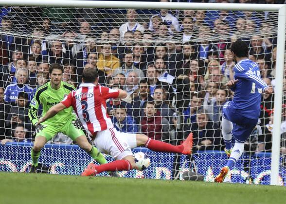 Football - 2013 2014 Premier League - Chelsea vs. Stoke City Mohamed Salah of Chelsea, making his first full start for Chelsea, gets an early shot at goal at Stamford Bridge Colorsport Daniel Bearham  CHELSEA_STOKE