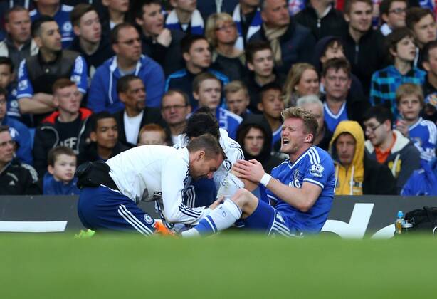 Chelsea s Andre Schurrle injures his leg Chelsea vs Stoke City- Premier League - Stamford Bridge- London - England - 05 03 2014 - Pic David Klein Sportimage EDITORIAL USE ONLY. No use with unauthorised audio, video, data, fixture lists, club league logos or live services. Online in-match use limited to 120 images, no video emulation. No use in betting, games or single club league player publications.