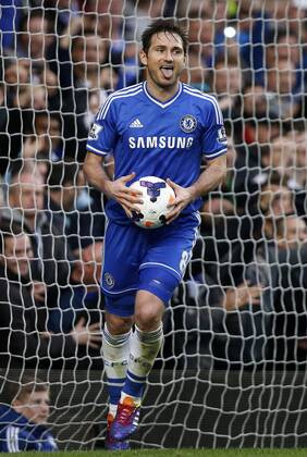 Frank Lampard of Chelsea celebrates scoring during the Barclays Premier League match between Chelsea and Stoke City at Emirates Stadium in London, Britain on April 5, 2014. Chelsea won 3-0. (Xinhua Wang Lili) FOR EDITORIAL USE ONLY. NOT FOR SALE FOR MARKETING OR ADVERTISING CAMPAIGNS. NO USE WITH UNAUTHORIZED AUDIO, VIDEO, DATA, FIXTURE LISTS, CLUB LEAGUE LOGOS OR LIVE SERVICES. ONLINE IN-MATCH USE LIMITED TO 45 IMAGES, NO VIDEO EMULATION. NO USE IN BETTING, GAMES OR SINGLE CLUB LEAGUE PLAYER PUBLICATIONS. (SP)BRITAIN-LONDON-SOCCER-PREMIER LEAGUE-CHELSEA VS STOKE CITY