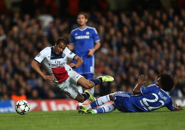Chelsea s Willian fouls PSG s Lucas Chelsea vs Paris Saint Germain- Champions League, Knockout - Stamford Bridge - London - England - 08 04 2014 - Pic David Klein Sportimage EDITORIAL USE ONLY. No use with unauthorised audio, video, data, fixture lists, club league logos or live services. Online in-match use limited to 120 images, no video emulation. No use in betting, games or single club league player publications.