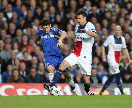 Chelsea s Oscar tussles with PSG s Thiago Motta Chelsea vs Paris Saint Germain- Champions League, Knockout - Stamford Bridge - London - England - 08 04 2014 - Pic David Klein Sportimage EDITORIAL USE ONLY. No use with unauthorised audio, video, data, fixture lists, club league logos or live services. Online in-match use limited to 120 images, no video emulation. No use in betting, games or single club league player publications.