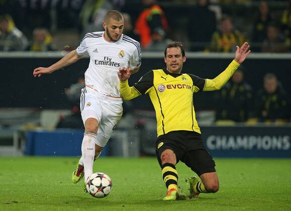 08.04.2014, Fussball Champions League 2013 2014, Viertelfinale, Rückspiel, Borussia Dortmund - Real Madrid, im Signal-Iduna-Park-Stadion in Dortmund, v.l. Karim Benzema (Real Madrid) gegen Manuel Friedrich (Dortmund) 