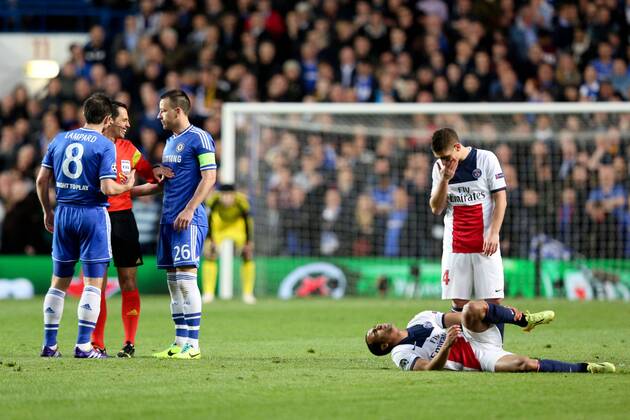 John Terry of Chelsea appeals to the referee to not give a card for a foul on Thiago Silva of Paris Saint-Germain - Chelsea vs Paris Saint-Germain - Champions League Quater-Final Second Leg - Stamford Bridge Stadium - London - 8th April 2014 - Pic Charlie Forgham-Bailey Sportimage EDITORIAL USE ONLY. No use with unauthorised audio, video, data, fixture lists, club league logos or live services. Online in-match use limited to 120 images, no video emulation. No use in betting, games or single club league player publications.