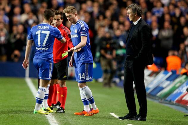 Eden Hazard of Chelsea is subbed early for André Schurrle of Chelsea- Chelsea vs Paris Saint-Germain - Champions League Quater-Final Second Leg - Stamford Bridge Stadium - London - 8th April 2014 - Pic Charlie Forgham-Bailey Sportimage EDITORIAL USE ONLY. No use with unauthorised audio, video, data, fixture lists, club league logos or live services. Online in-match use limited to 120 images, no video emulation. No use in betting, games or single club league player publications.