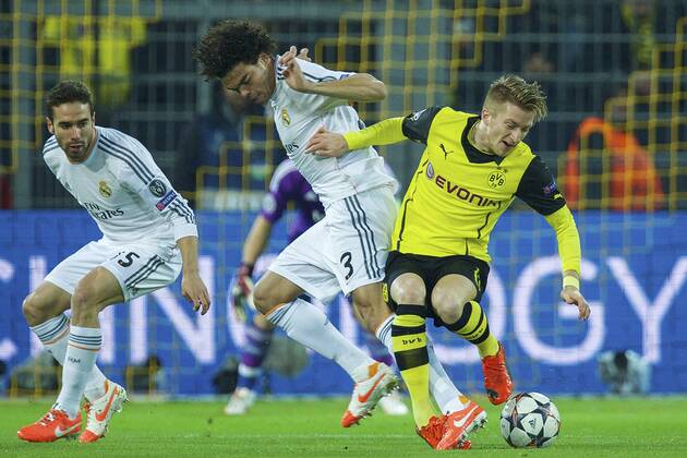 (L-R) Daniel Carvajal of Real Madrid, Pepe of Real Madrid, Marco Reus of Borussia Dortmund during the UEFA Champions League match between Borussia Dortmund and Real Madrid on April 8, 2013 at the Signal Iduna Park stadium in Dortmund, Germany. Borussia Dortmund v Real Madrid Champions League 2013 2014 xVIxxIVx 2226867