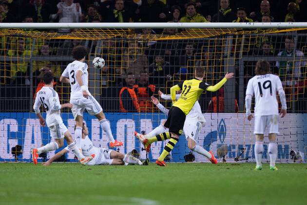 Marco Reus of Dortmund scores his sides second goal - UEFA Champions League - Quarter Final 2nd Leg - Borussia Dortmund vs. Real Madrid - Signal Iduna Park - Dortmund - Germany - 8th April 2014 - Picture Philip Oldham Sportimage EDITORIAL USE ONLY. No use with unauthorised audio, video, data, fixture lists, club league logos or live services. Online in-match use limited to 120 images, no video emulation. No use in betting, games or single club league player publications.