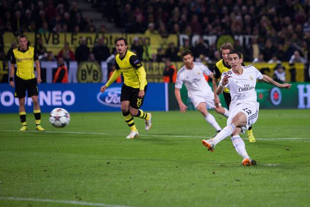 Angel di Maria of Real Madrid slips as he takes a penalty and fails to score - UEFA Champions League - Quarter Final 2nd Leg - Borussia Dortmund vs. Real Madrid - Signal Iduna Park - Dortmund - Germany - 8th April 2014 - Picture Philip Oldham Sportimage EDITORIAL USE ONLY. No use with unauthorised audio, video, data, fixture lists, club league logos or live services. Online in-match use limited to 120 images, no video emulation. No use in betting, games or single club league player publications.