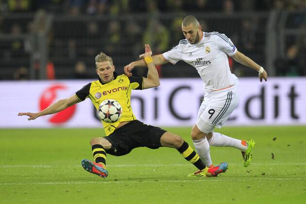 Karim Benzema (Real Madrid CF 9) im Zweikampf gegen Oliver Kirch (Borussia Dortmund 21) Borussia Dortmund vs Real Madrid C.F. --- Fussball --- Champions League --- Viertelfinale --- 08.04.2014 Foto: Schueler Eibner EP_JSE
