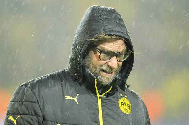 Trainer Juergen Klopp (Borussia Dortmund) im Regen von Dortmund Borussia Dortmund vs Real Madrid C.F. --- Fussball --- Champions League --- Viertelfinale --- 08.04.2014 Foto: Schueler Eibner EP_JSE