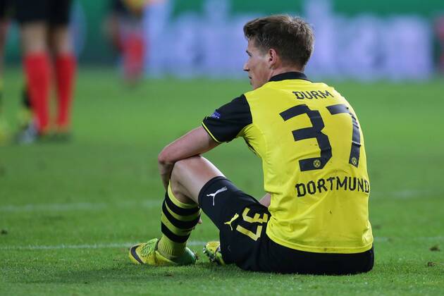 08.04.2014, xgsx, Fussball Champions League, Borussia Dortmund - Real Madrid, v.l. Eric Durm (BVB Borussia Dortmund - 37) ist enttaeuscht, ist frustriert, frust, zeigt Emotionen