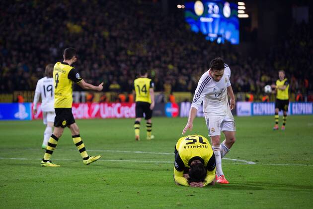 Mats Hummels of Dortmund looks dejected at full time as he misses a late chance - UEFA Champions League - Quarter Final 2nd Leg - Borussia Dortmund vs. Real Madrid - Signal Iduna Park - Dortmund - Germany - 8th April 2014 - Picture Philip Oldham Sportimage EDITORIAL USE ONLY. No use with unauthorised audio, video, data, fixture lists, club league logos or live services. Online in-match use limited to 120 images, no video emulation. No use in betting, games or single club league player publications.
