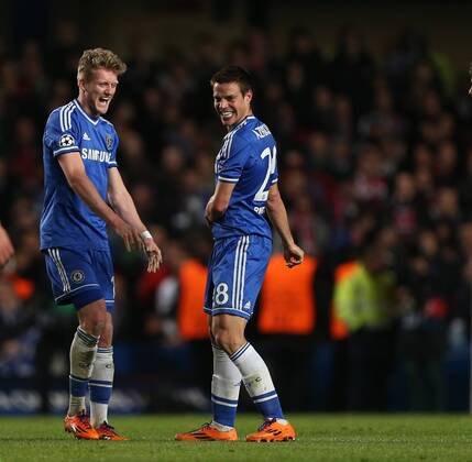Chelsea s Andre Schurrle celebrates at the final whistle with Cesar Azpilicueta Chelsea vs Paris Saint Germain- Champions League, Knockout - Stamford Bridge - London - England - 08 04 2014 - Pic David Klein Sportimage EDITORIAL USE ONLY. No use with unauthorised audio, video, data, fixture lists, club league logos or live services. Online in-match use limited to 120 images, no video emulation. No use in betting, games or single club league player publications.