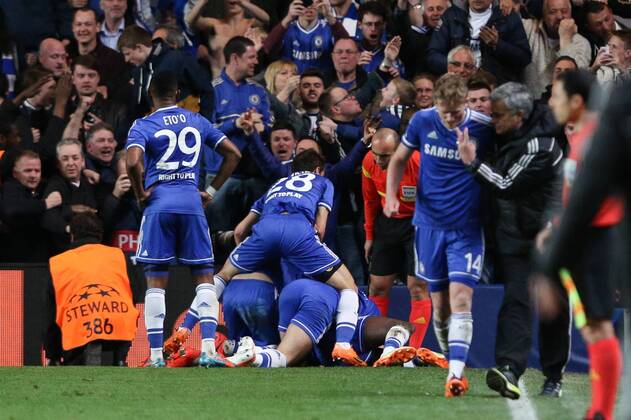 Samuel Eto o of Chelsea celebrates scoring his sides 2nd goal - Chelsea vs Paris Saint-Germain - Champions League Quater-Final Second Leg - Stamford Bridge Stadium - London - 8th April 2014 - Pic Charlie Forgham-Bailey Sportimage EDITORIAL USE ONLY. No use with unauthorised audio, video, data, fixture lists, club league logos or live services. Online in-match use limited to 120 images, no video emulation. No use in betting, games or single club league player publications.