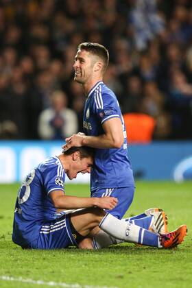 Cesar Azpilicueta of Chelsea and Gary Cahill of Chelsea celebrate the win - Chelsea vs Paris Saint-Germain - Champions League Quater-Final Second Leg - Stamford Bridge Stadium - London - 8th April 2014 - Pic Charlie Forgham-Bailey Sportimage EDITORIAL USE ONLY. No use with unauthorised audio, video, data, fixture lists, club league logos or live services. Online in-match use limited to 120 images, no video emulation. No use in betting, games or single club league player publications.