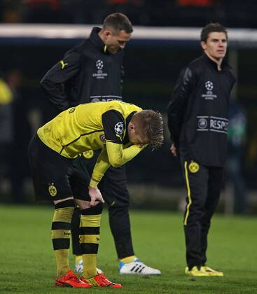 08.04.2014, Fussball Champions League 2013 2014, Viertelfinale, Rückspiel, Borussia Dortmund - Real Madrid, im Signal-Iduna-Park-Stadion in Dortmund, enttäuscht v.l. Marco Reus (Dortmund) , Julian Schieber (Dortmund) und Marvin Ducksch (Dortmund) 