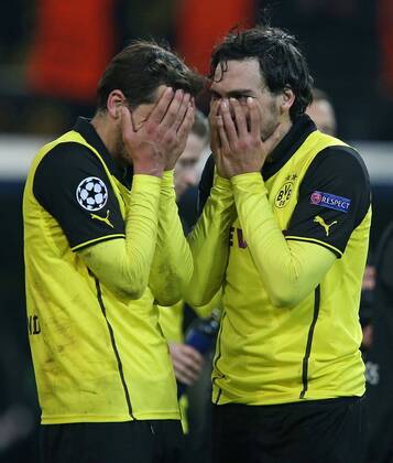 08.04.2014, Fussball Champions League 2013 2014, Viertelfinale, Rückspiel, Borussia Dortmund - Real Madrid, im Signal-Iduna-Park-Stadion in Dortmund, enttäuscht v.l. Manuel Friedrich (Dortmund) und Mats Hummels (Dortmund) 