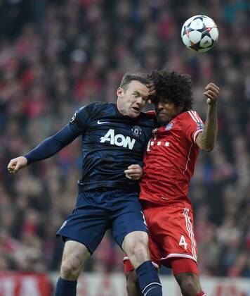 FUSSBALL CHAMPIONS LEAGUE VIERTELFINALE SAISON 2013 2014 FC Bayern München - Manchester United FC 09.04.2014 Wayne Rooney (li, Manchester United FC) gegen Dante (re, FC Bayern München) 