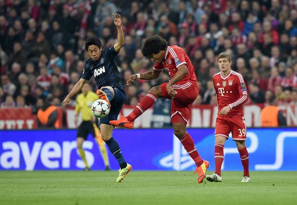 FUSSBALL CHAMPIONS LEAGUE VIERTELFINALE SAISON 2013 2014 FC Bayern München - Manchester United FC 09.04.2014 Shinji Kagawa (li, Manchester United FC) gegen Dante (re, FC Bayern München) 