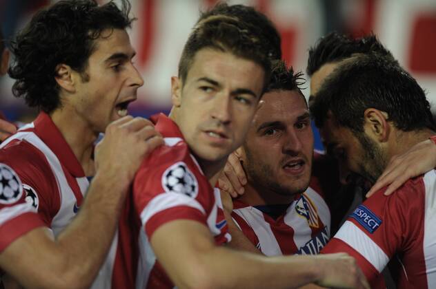 Atletico de Madrid Midfielder, number 14 GABI - Gabriel Fenandez Arenas (29), celebrates after scoring a goal (1-0)Atletico de Madrid Midfielder, number 6 KOKE - Jorge Resurreccion Merodio (20) during round Quarter Final of the Uefa Champions League league, soccer match between Atletico de Madrid - FC Barcelona at the Vicente Calderon estadium, Madrid - Spain by April 9, 2014. 
