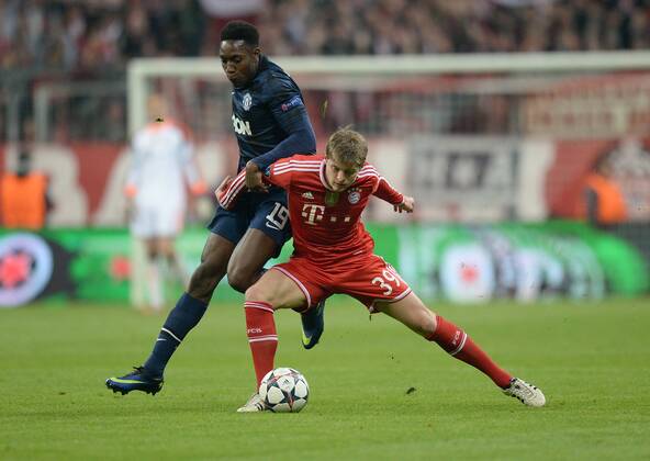 FUSSBALL CHAMPIONS LEAGUE VIERTELFINALE SAISON 2013 2014 FC Bayern München - Manchester United FC 09.04.2014 Daniel Welbeck (li, Manchester United FC) gegen Toni Kroos (re, FC Bayern München) FOTO: Pressefoto ULMER Andreas Schaad xxNOxMODELxRELEASEx 