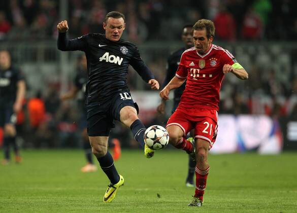 Wayne Rooney, Philipp Lahm Aktion Spielszene Zweikampf Fussball Fussball UEFA Chapionsleague Viertelfinale Herren Saison 2013 14 09.04.2014 FC Bayern München vs. FC Manchester United ManU