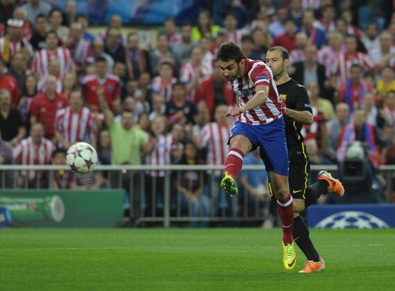 Atletico de Madrid Forward, number 7 ADRIAN - Adrian Lopez Alvarez (24) during round Quarter Final of the Uefa Champions League league, soccer match between Atletico de Madrid - FC Barcelona at the Vicente Calderon estadium, Madrid - Spain by April 9, 2014. 