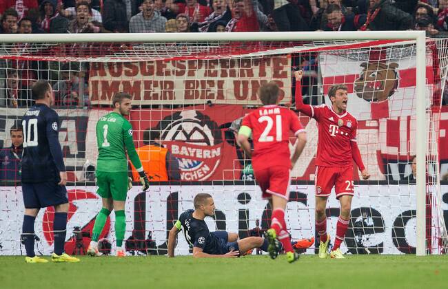 Thomas Müller of Munich celebrates scoring his sides second goal - UEFA Champions League - Quarter Final 2nd Leg - Bayern Munich vs. Manchester United - Allianz Arena - Munich - Germany - 9th April 2014 - Picture PhilipxOldham Sportimage EDITORIAL USE ONLY. No use with unauthorised audio, video, data, fixture lists, club league logos or live services. Online in-match use limited to 120 images, no video emulation. No use in betting, games or single club league player publications.