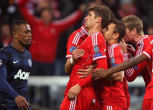 FUSSBALL - CL, Bayern vs Manchester MÜNCHEN,DEUTSCHLAND,09.APR.14 - FUSSBALL - UEFA Champions League, Viertelfinale, FC Bayern München vs Manchester United. Bild zeigt den Jubel von Thomas Müller und Marcio Rafaul Ferreira de Souza (Bayern). 