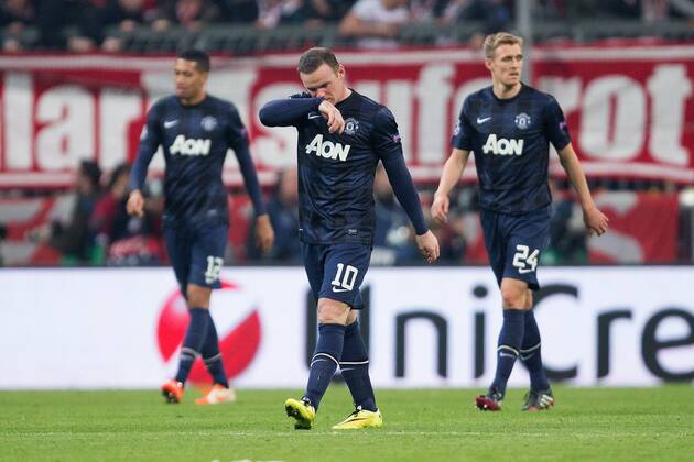 Wayne Rooney of Manchester United looks dejected - UEFA Champions League - Quarter Final 2nd Leg - Bayern Munich vs. Manchester United - Allianz Arena - Munich - Germany - 9th April 2014 - Picture PhilipxOldham Sportimage EDITORIAL USE ONLY. No use with unauthorised audio, video, data, fixture lists, club league logos or live services. Online in-match use limited to 120 images, no video emulation. No use in betting, games or single club league player publications.