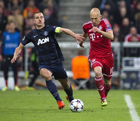 Nemanja Vidic (ManU), Arjen Robben (FCB) 09.04.2014, München, FC Bayern München vs. Manchester United FC