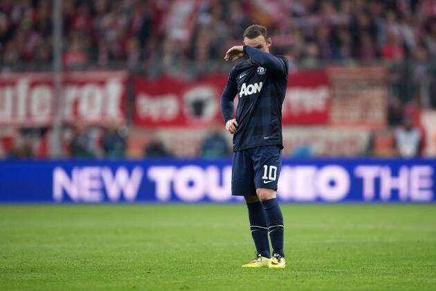 Wayne Rooney of Manchester United looks dejected - UEFA Champions League - Quarter Final 2nd Leg - Bayern Munich vs. Manchester United - Allianz Arena - Munich - Germany - 9th April 2014 - Picture PhilipxOldham Sportimage EDITORIAL USE ONLY. No use with unauthorised audio, video, data, fixture lists, club league logos or live services. Online in-match use limited to 120 images, no video emulation. No use in betting, games or single club league player publications.