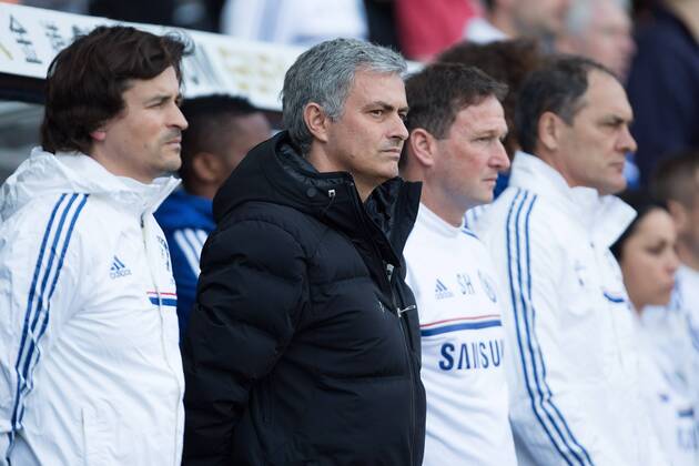 Manager of Chelsea, Jose Mourinho watches on during the minutes silence in remembrance of the Hillsborough tragedy - Barclays Premier League - Swansea City vs. Chelsea - Liberty Stadium - Swansea - Wales - 13th April 2014 - Picture Philip Oldham Sportimage EDITORIAL USE ONLY. No use with unauthorised audio, video, data, fixture lists, club league logos or live services. Online in-match use limited to 120 images, no video emulation. No use in betting, games or single club league player publications.