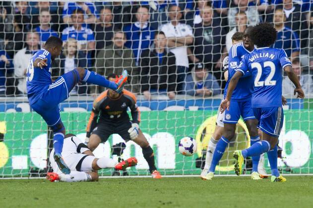 Football - 2013 2014 Premier League - Swansea City vs. Chelsea Demba Ba of Chelsea shoots at goal at the the Liberty Stadium. COLORSPORT WINSTON BYNORTH