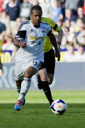 Football - 2013 2014 Premier League - Swansea City vs. Chelsea Wayne Routledge of Swansea breaks at the the Liberty Stadium. COLORSPORT WINSTON BYNORTH