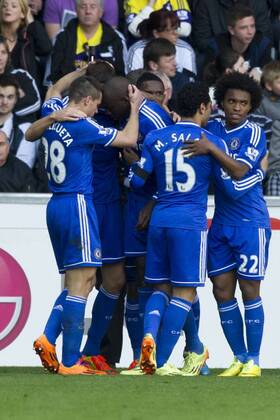 Football - 2013 2014 Premier League - Swansea City vs. Chelsea Demba Ba of Chelsea celebrates after scoring their 1st goal at the the Liberty Stadium. COLORSPORT WINSTON BYNORTH