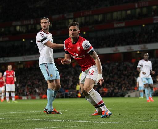 Arsenal s Olivier Giroud celebrates scoring his sides second goal Arsenal vs West Ham United- Barclays Premier League - Emirates Stadium - London - England - 15 04 2014 - Pic David Klein Sportimage EDITORIAL USE ONLY. No use with unauthorised audio, video, data, fixture lists, club league logos or live services. Online in-match use limited to 120 images, no video emulation. No use in betting, games or single club league player publications.