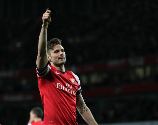 Arsenal s Olivier Giroud celebrates scoring his sides second goal holding up hos Hillborough armband Arsenal vs West Ham United- Barclays Premier League - Emirates Stadium - London - England - 15 04 2014 - Pic David Klein Sportimage EDITORIAL USE ONLY. No use with unauthorised audio, video, data, fixture lists, club league logos or live services. Online in-match use limited to 120 images, no video emulation. No use in betting, games or single club league player publications.