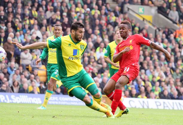 Norwich City v Liverpool . . Norwich, UK . . 20.04.2014 Raheem Sterling (L) scores a goal for Liverpool. 1-3 