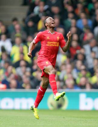 Norwich City v Liverpool . . Norwich, UK . . 20.04.2014 Raheem Sterling (L) celebrates scoring a goal for Liverpool. 0-1 