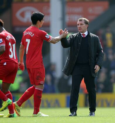 Norwich City v Liverpool . . Norwich, UK . . 20.04.2014 Brendan Rodgers (Liverpool manager) and Luis Suarez (L) at the end. 