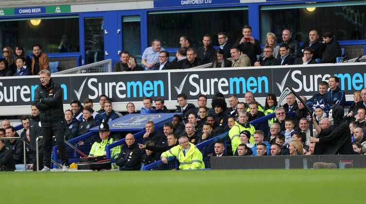 A fan dressed as the grim reaper barracks Manchester United s Davids Moyes Everton vs Manchester United- Barclays Premier League - Goodison Park - Liverpool - England - 20 04 2014 - EDITORIAL USE ONLY. No use with unauthorised audio, video, data, fixture lists, club league logos or live services. Online in-match use limited to 120 images, no video emulation. No use in betting, games or single club league player publications.