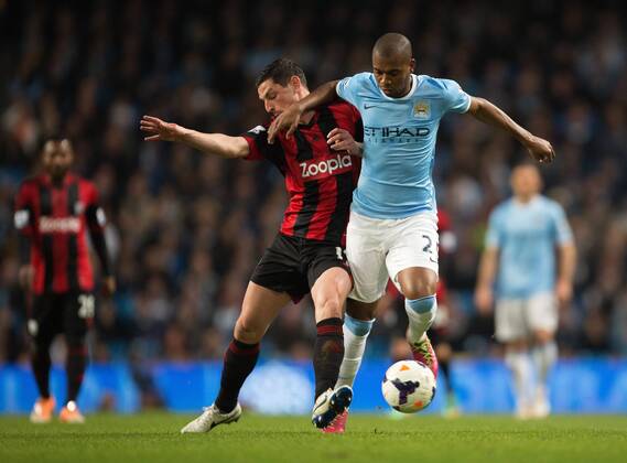 West Brom s Graham Dorrans battles Fernandinho of Manchester City - Barclays Premier League - Manchester City vs. West Bromwich Albion - Etihad Stadium - Manchester - England - 21st April 2014 - Pic by Philip Oldham SportImage EDITORIAL USE ONLY. No use with unauthorised audio, video, data, fixture lists, club league logos or live services. Online in-match use limited to 120 images, no video emulation. No use in betting, games or single club league player publications.